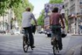 cyclists riding without helmets